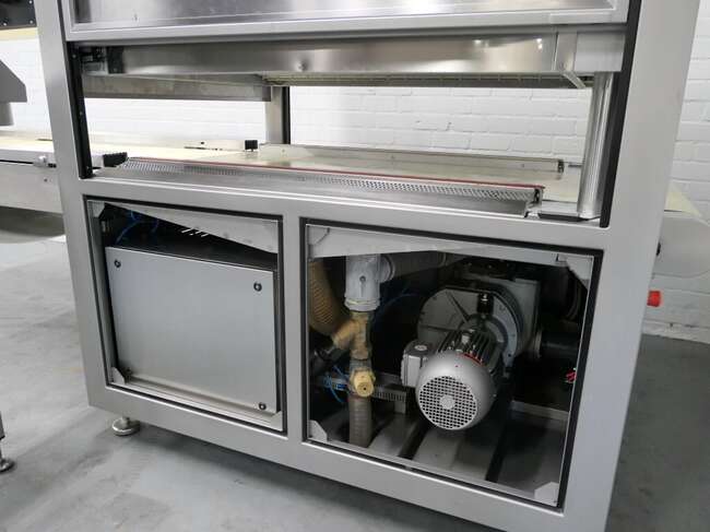 Webomatic belt vacuum machine